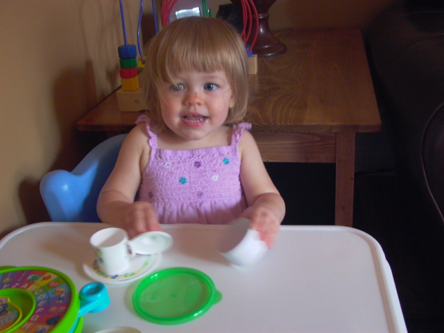 Erica and her tea set
